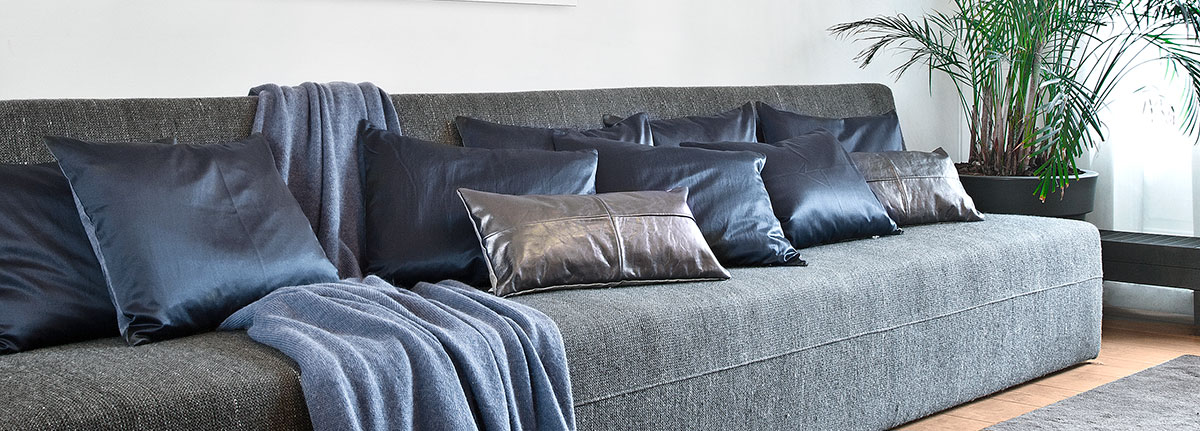 Pavilion Graphite Leather Cushion on sofa